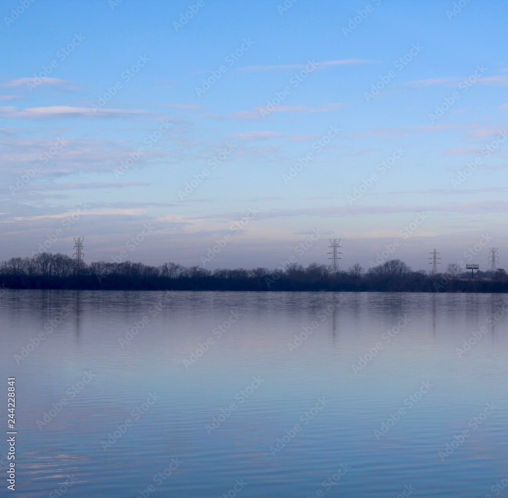 The foggy horizon at the lake on a cold winter morning. The foggy horizon at the lake on a cold winter morning.