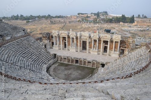 Theater antique. The woman in white in the ancient theatre. The ancient stairs. Antique staircase in the ancient theater. Pamukkale. Denizli. Turkey 