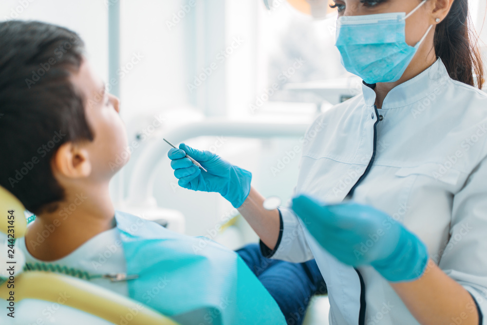 Smiling little boy in a dental chair Smiling little boy in a dental chair