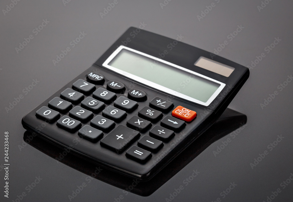 Old black old-style calculator Old black old-style calculator