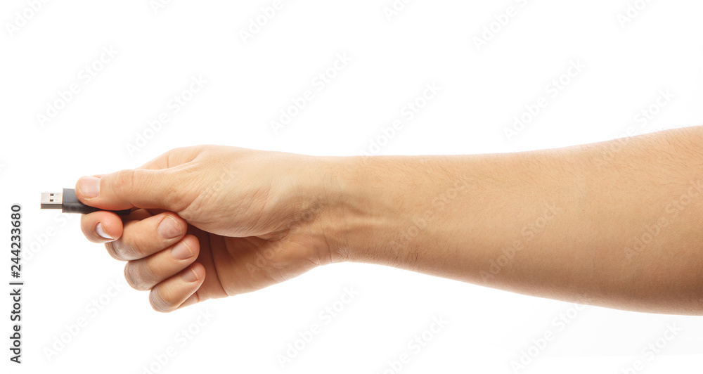 Flash drive in hand isolated on white background. Hand with an USB flash. Alpha. Flash drive in hand isolated on white background. Hand with an USB flash. Alpha.