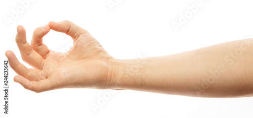 Male hand show OK sign, isolated with clipping path on white background. Yoga hand female isolated on white background. Mudra hands. Alpha.