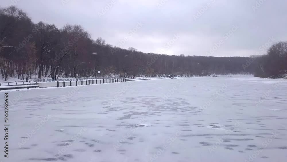Low level flight with climb above the frozen Moscow river Low level flight with climb above the frozen Moscow river