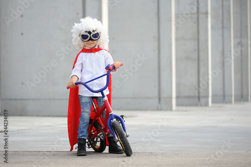 A funny, little superhero. Concept boy imagination. Happy childhood.