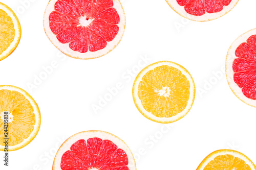 Fresh half cut grapefruit and orange isolated on white background. Close up view. Fruit concept. Healthy lifestyle concept.