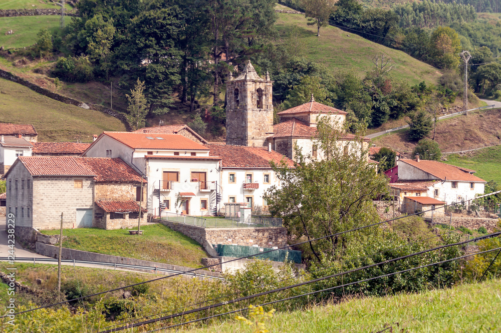 Rural village in the mountains of Asturias in the north of Spain on a sunny day. Rural village in the mountains of Asturias in the north of Spain on a sunny day.