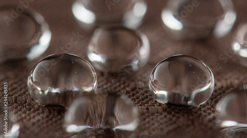 Картината върху платно Water droplets on moisture resistant fabric Close up