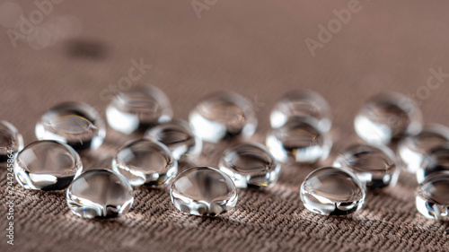 Fotografia Water droplets on moisture resistant fabric Close up