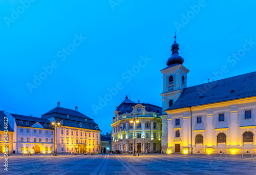 The Big Square with the Citty Hall in Sibiu at sunrise in Transylvania region, Romania