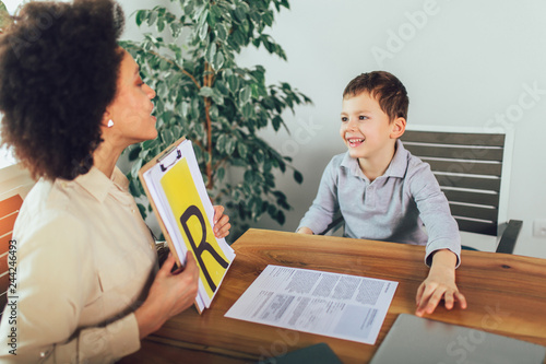 Принти на полотні Shot of a speech therapist during a session with a little boy