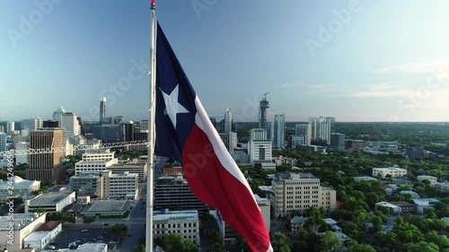 4K Aerial Texas Flag Blows Over Austin