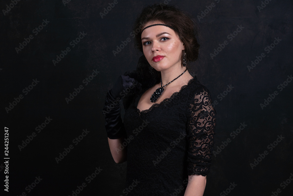 Portrait of a young beautiful girl in a beautiful evening dress. Portrait of a young beautiful girl in a beautiful evening dress.