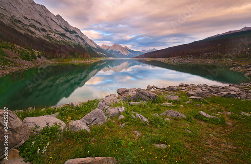 Beautiful sunset over Medicine Lake, Jasper National Park, Alberta, Canada photo