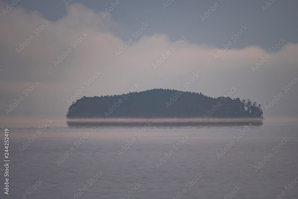 Island Appearing out of the Morning Fog