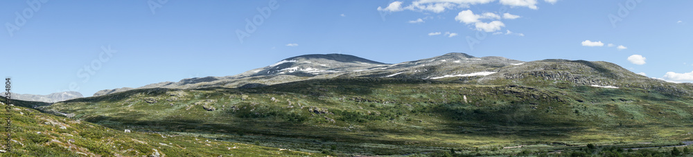 Landschaftspanorama im Skanmsdalsvegen im Dovrefjell Landschaftspanorama im Skanmsdalsvegen im Dovrefjell