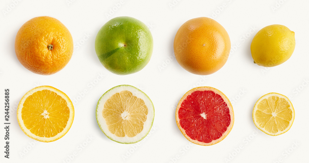 Fresh citrus fruits orange, lemon, grapefruit, pomelo whole half-sliced from above, pattern for layout. concept of healthy eat food and nutrition, space for layout. Fresh citrus fruits orange, lemon, grapefruit, pomelo whole half-sliced from above, pattern for layout. concept of healthy eat food and nutrition, space for layout.