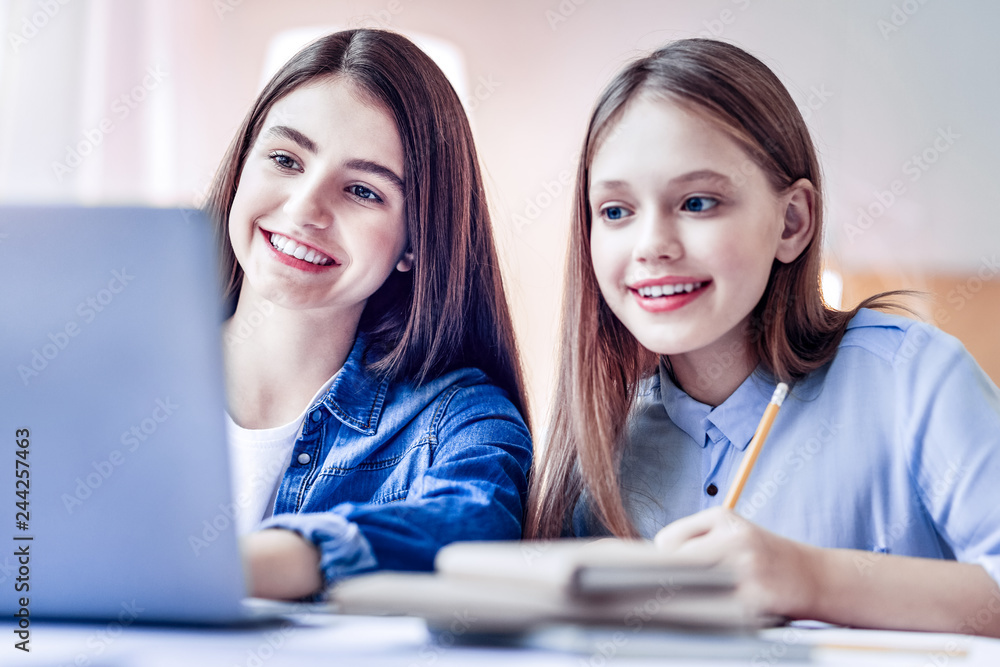 Vigorous two girls brainstorming when studying hard