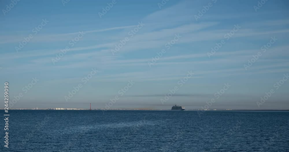 Timelapse cruise ship goes on a trip from the port. Timelapse cruise ship goes on a trip from the port.