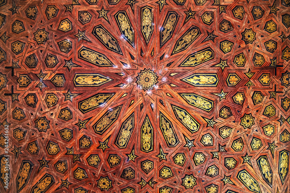 Detail of the wooden ceiling in the royal palace Nazaries of the Alhambra, Granada, Andalucia, Spain - obrazy, fototapety, plakaty 