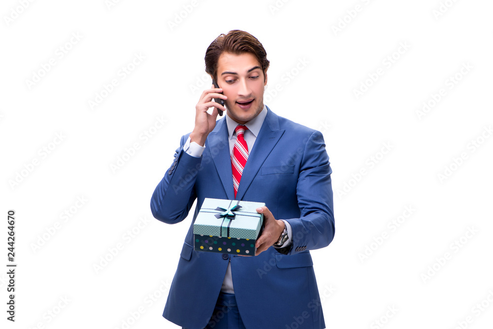 Elegant businessman with giftbox isolated on white Elegant businessman with giftbox isolated on white