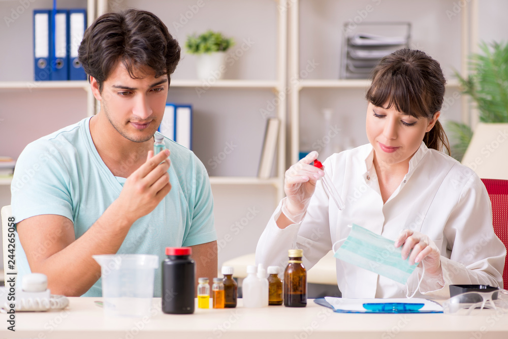Doctor getting saliva test sample in clinic hospital Doctor getting saliva test sample in clinic hospital