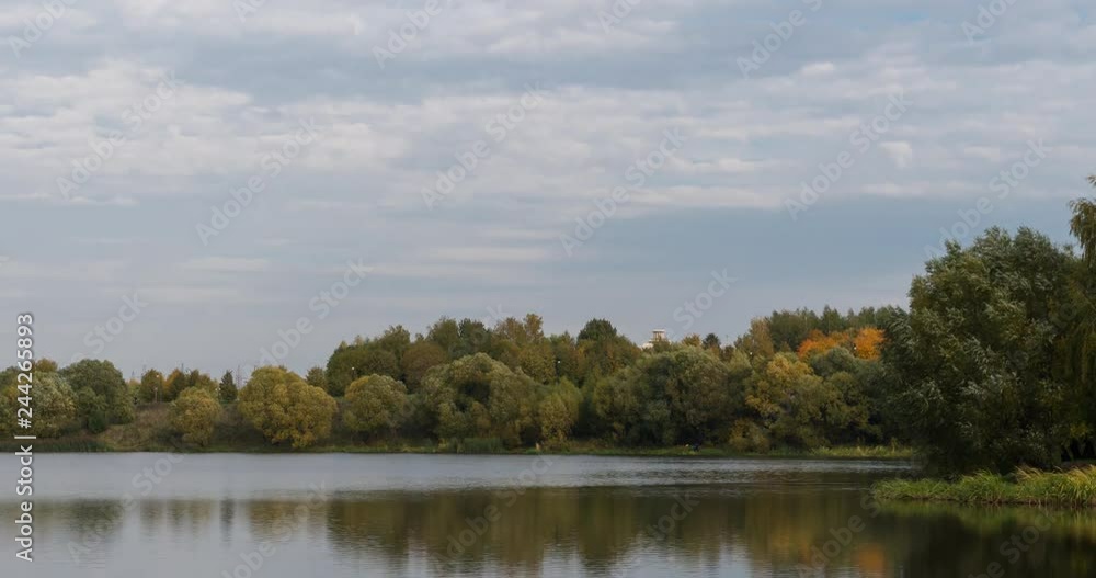 Beautiful Time lapse autumn landscape in forest by the lake. Beautiful Time lapse autumn landscape in forest by the lake.