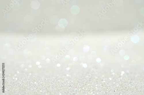Silver and white glitter abstract bokeh background Christmas 