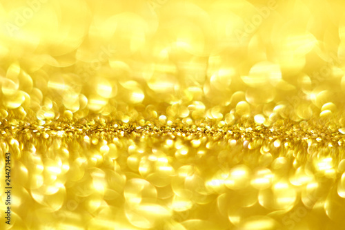gold and white glitter abstract bokeh background Christmas 