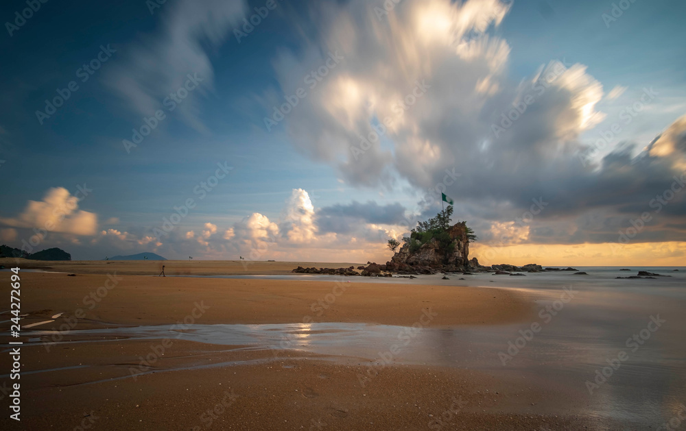 Standing rocks near the sea in long exposure shot.Motion blur Standing rocks near the sea in long exposure shot.Motion blur