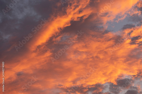 evening sky with colorful sunlight on cloudy in the evening background © Chayut