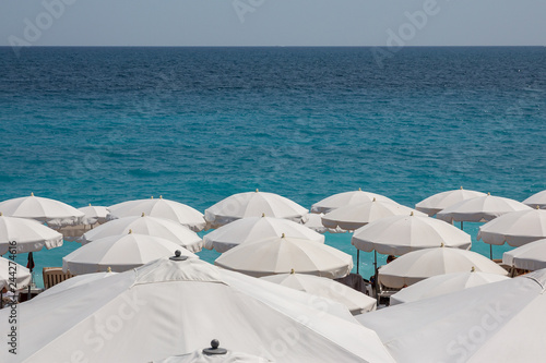 White umbrella's at Nice beach in the south of France
