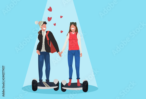 Couple riding electric scooter hover board happy