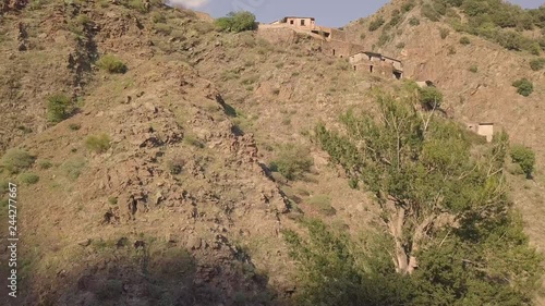 Stunning 4k riseup drone aerial footage of abandoned ghost town of Roghudi Vecchia, Calabria, Italy.