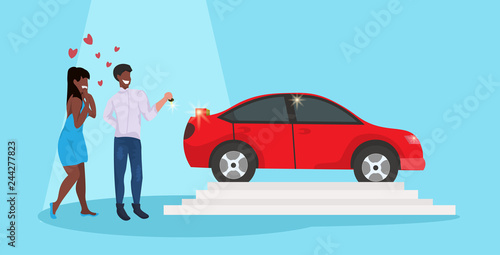 man giving woman keys to new car happy valentines day holiday concept african american couple in love over red heart shapes female male full length characters horizontal flat