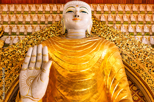 Buddha statues in the Dhammikarama Burmese Buddhist Temple,and it is situated along Burma Lane in Pulau Tikus,it was built in 1803. photo