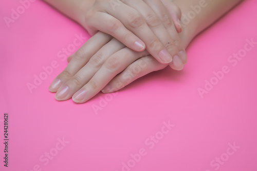 well-groomed female hands of a young girl. body care concept, manicure, skin and nail care