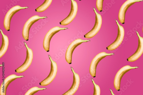 Bananas entirely on a pink background. Minimal fruit concept