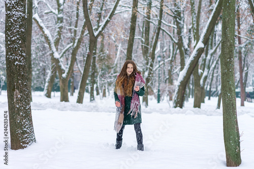 woman with snow in the park © Gribanov