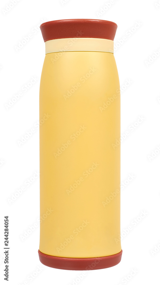 Yellow metal thermos for hot drinks, travel concept Yellow metal thermos for hot drinks, travel concept