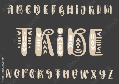 Vector brush pen handwritten capital alphabet  decorated with boho ornaments on a black background