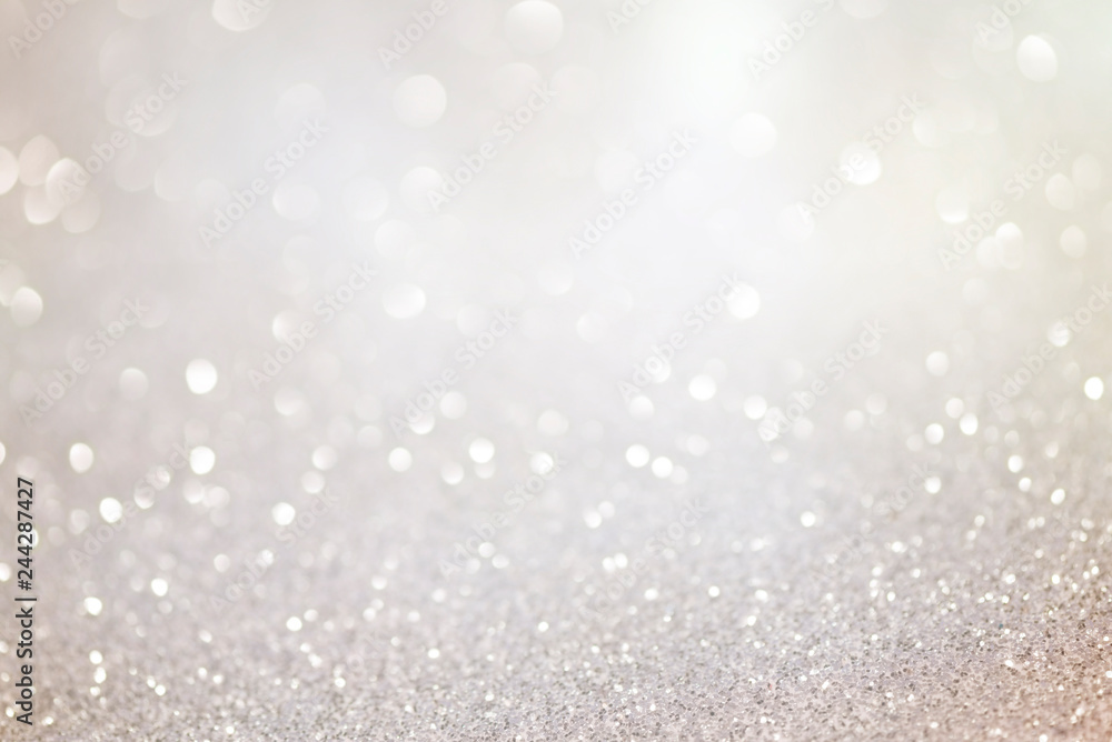 Silver glittering christmas lights. Blurred abstract background - obrazy, fototapety, plakaty 