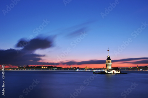 Romantic Istanbul Sunset Landscape. Istanbul Bosphorus and Maiden's Tower view with beautiful blue romantic sky. Istanbul, Turkey..