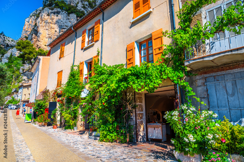 Spectacular medieval mediterranean facades in Moustiers-Sainte-Marie, Provence, France Spectacular medieval mediterranean facades in Moustiers-Sainte-Marie, Provence, France