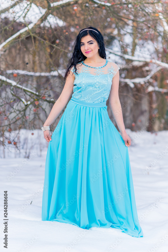 Arabic modern woman in long romantic fashionable dress, womens fashion, cold season Arabic modern woman in long romantic fashionable dress, womens fashion, cold season