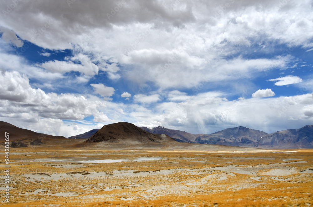 China, Tibet. Trans-himalayas on the way to the lake, Ngangla Ring Tso in the summer in cloudy weather China, Tibet. Trans-himalayas on the way to the lake, Ngangla Ring Tso in the summer in cloudy weather