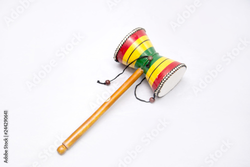 Ethnic musical instrument. Drum percussion instrument with a handle. Damaru photo