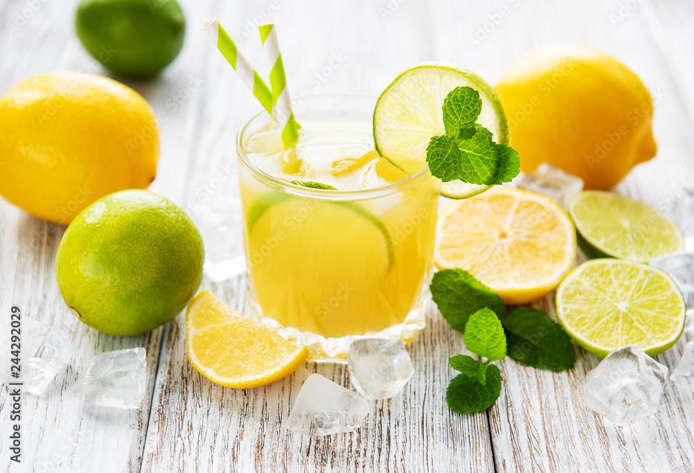 Glass with fresh lemon juice Glass with fresh lemon juice