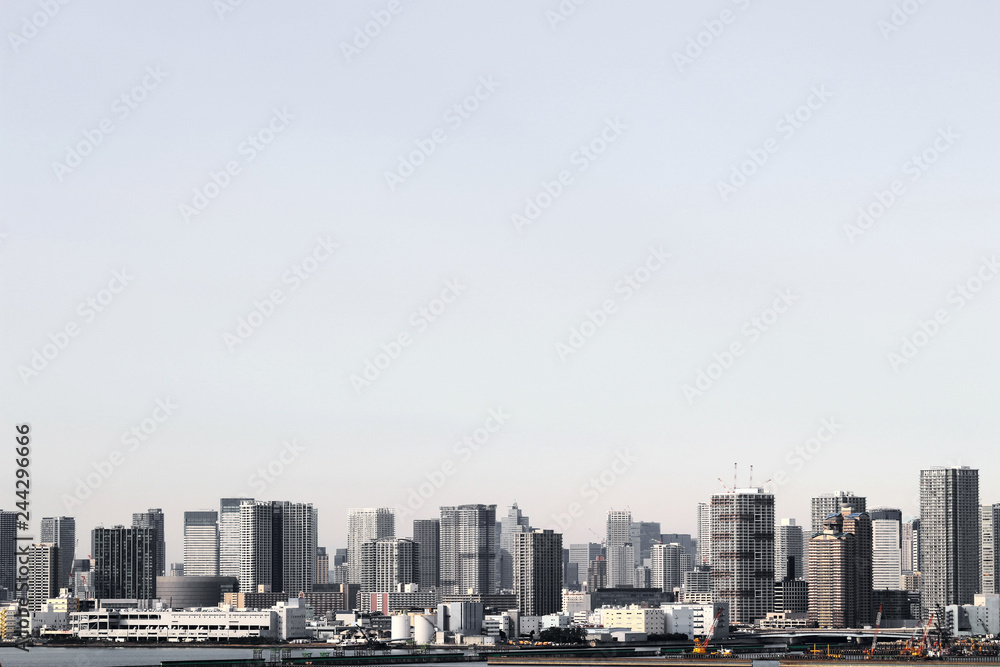 A scenery of a high-rise apartment that stands on the waterfront in Tokyo