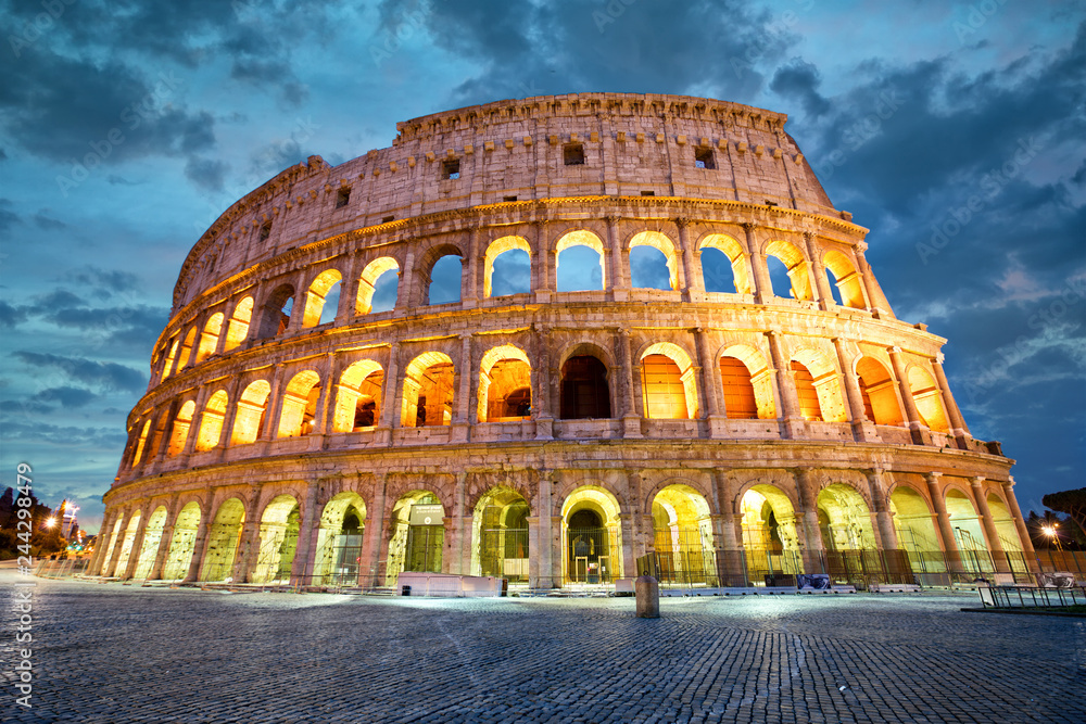 Coliseum or Flavian Amphitheatre in Rome at twilight, Italy