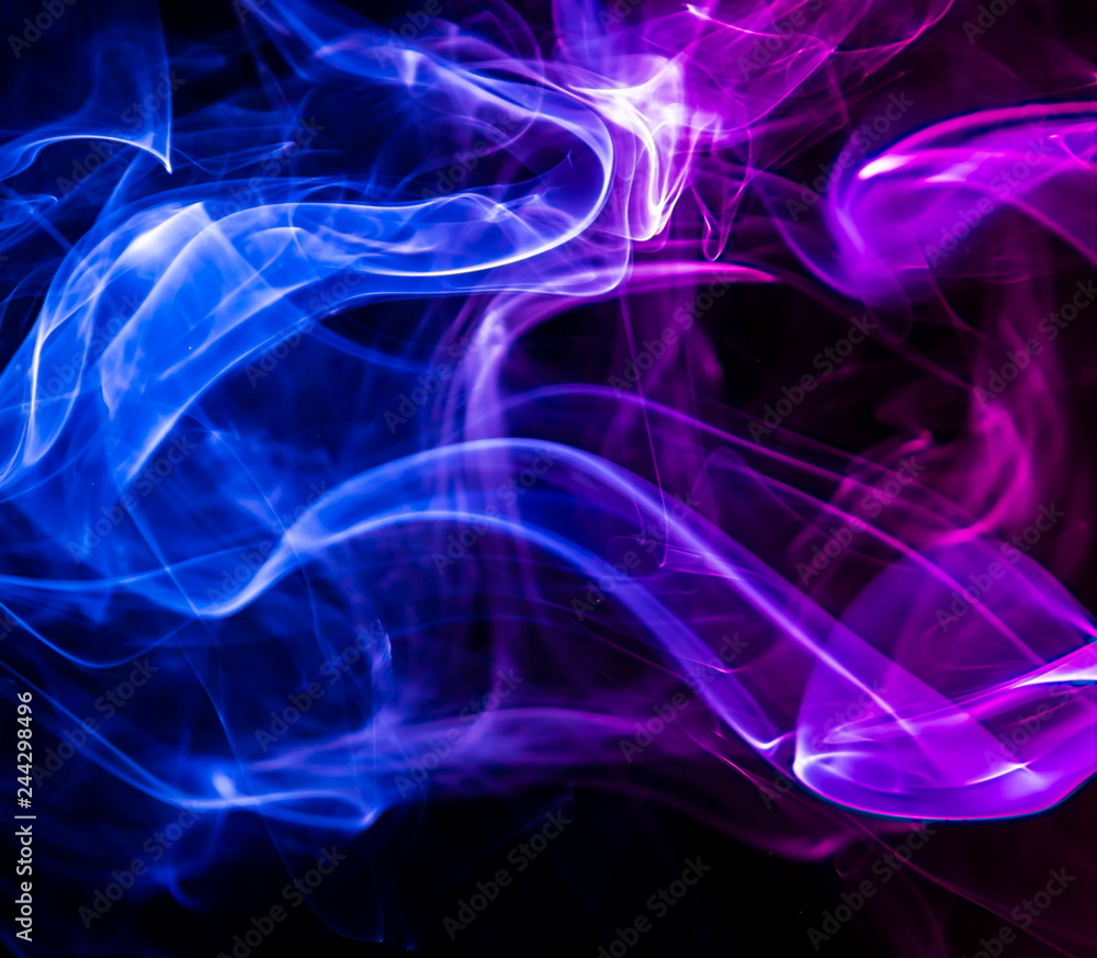 Colored smoke on black background Colored smoke on black background